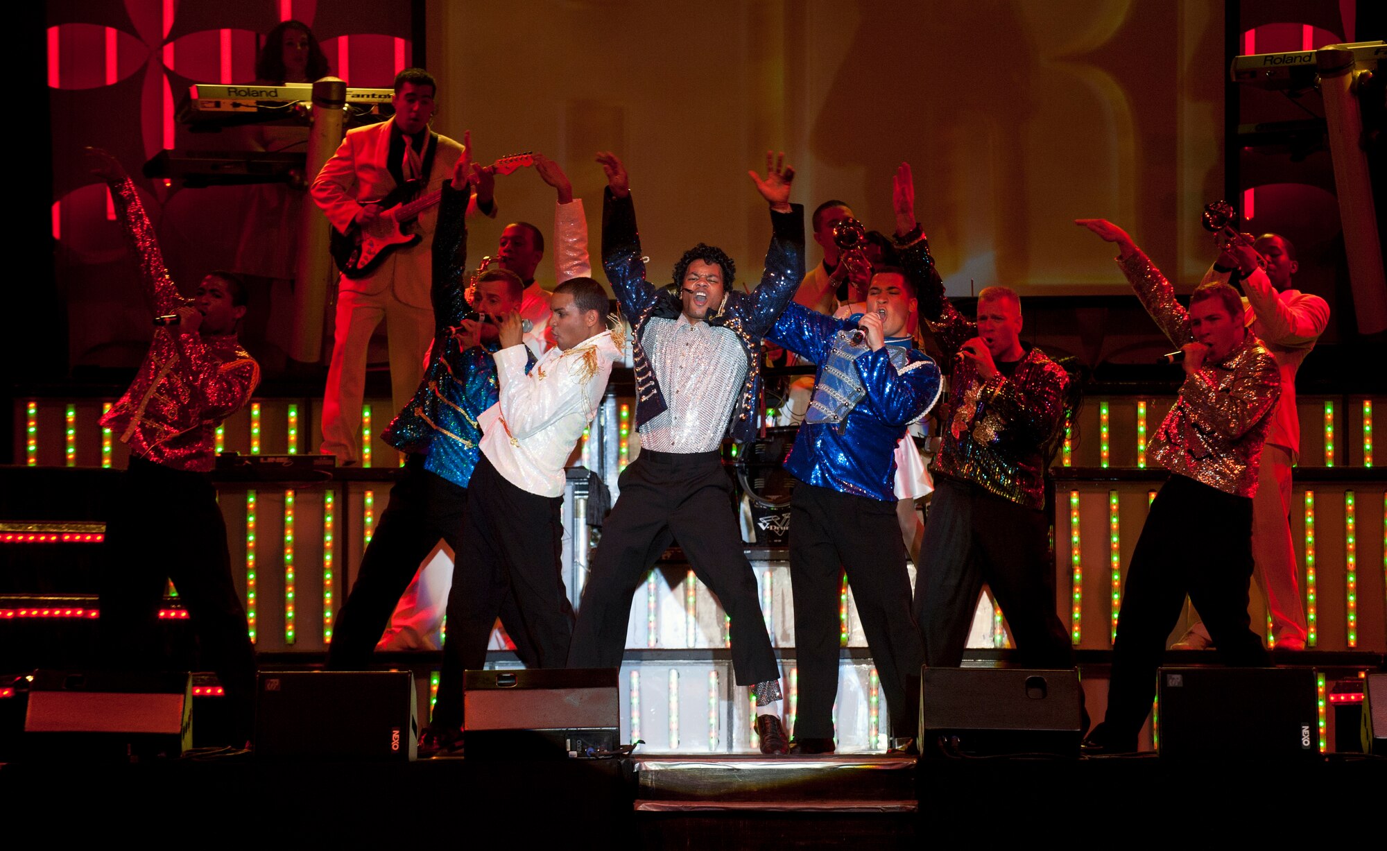Tops in Blue performs a song by Michael Jackson during a concert at Incirlik Air Base, Turkey, Oct. 13, 2012. Tops in Blue, an ensemble made up of diversely talented Airmen in the force, entertains military and civilian audiences around the globe with music. (U.S. Senior Airman Daniel Phelps/Released)