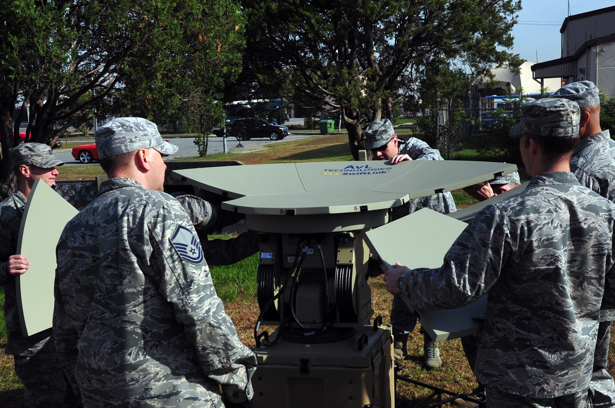 Members of the 607th Air Support Operations Group assemble a very small
aperture terminal (VSAT) at Osan Air Base, Republic of Korea, Oct. 15, 2012.
The Airmen were setting up their field equipment in preparation of an
upcoming peninsula exercise. (U.S. Air Force photo/Staff Sgt. Craig Cisek)
