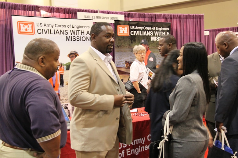 Employees of Southwestern Division in various management, human resources, and engineering fields talk to students at the 2012 Women of Color career fair held Oct. 11-13 at the Hilton Anatole Hotel in Dallas.