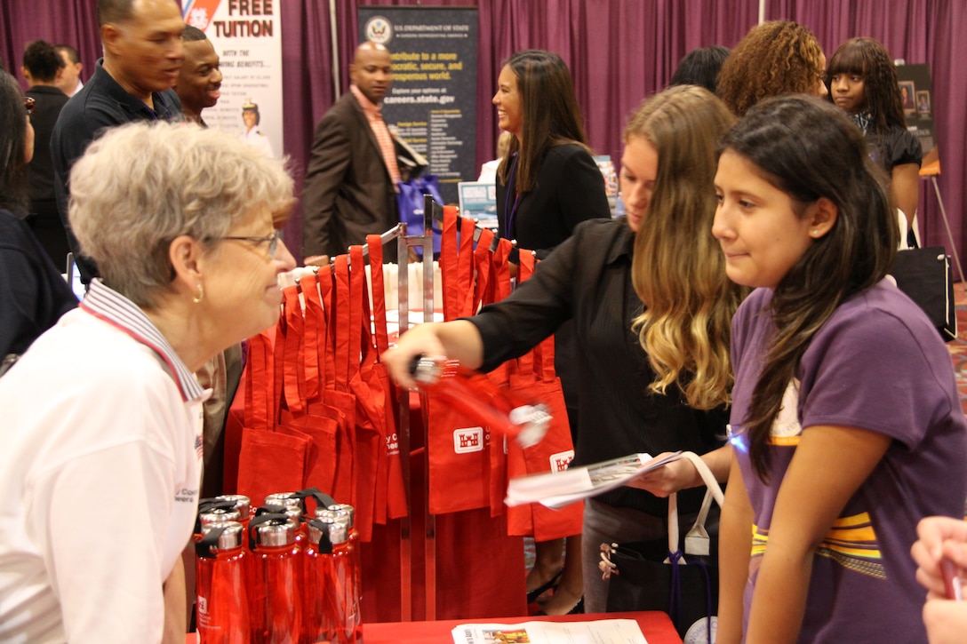 Employees of Southwestern Division in various management, human resources, and engineering fields talk to students at the 2012 Women of Color career fair held Oct. 11-13 at the Hilton Anatole Hotel in Dallas.