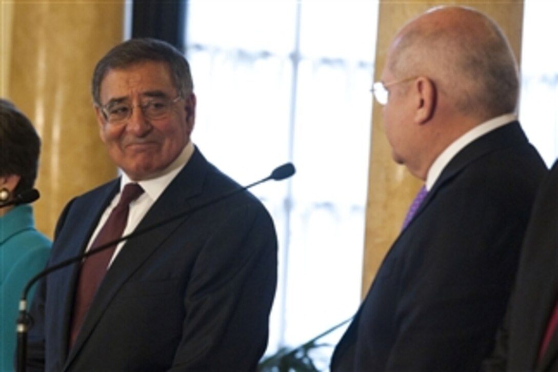Secretary of Defense Leon E. Panetta, left, listens to Peruvian Minister of Defense Pedro Cateriano Bellido, right, during a press conference in Lima, Peru, on Oct. 6, 2012.  Panetta is visiting South America on a four-day trip to strengthen defense relationships with Western Hemisphere counterparts and will attend the 10th Conference of Defense Ministers of the Americas this week in Uruguay.  