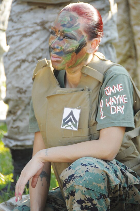 A spouse listens during training at Jane Wayne Day, Oct. 12, at Marine Corps Logistics Base Albany. Supervised by many former drill instructors, the authenticity of the training events was ensured as spouses conquered an obstacle course, rappel tower and pistol range.