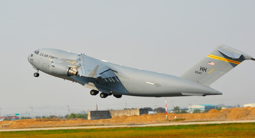 A C-17 Globemaster III takes off from Osan Air Base, Republic of Korea, Oct. 20, 2012, for an aerial demonstration at Air Power Day 2012. Air Power Day 2012 represents an annual opportunity for the United States to showcase its military personnel and unique equipment to a global audience. The C-17 is from Joint Base Pearl Harbor/Hickam, Hawaii. (U.S. Air Force photo/Staff Sgt. Stefanie Torres)
