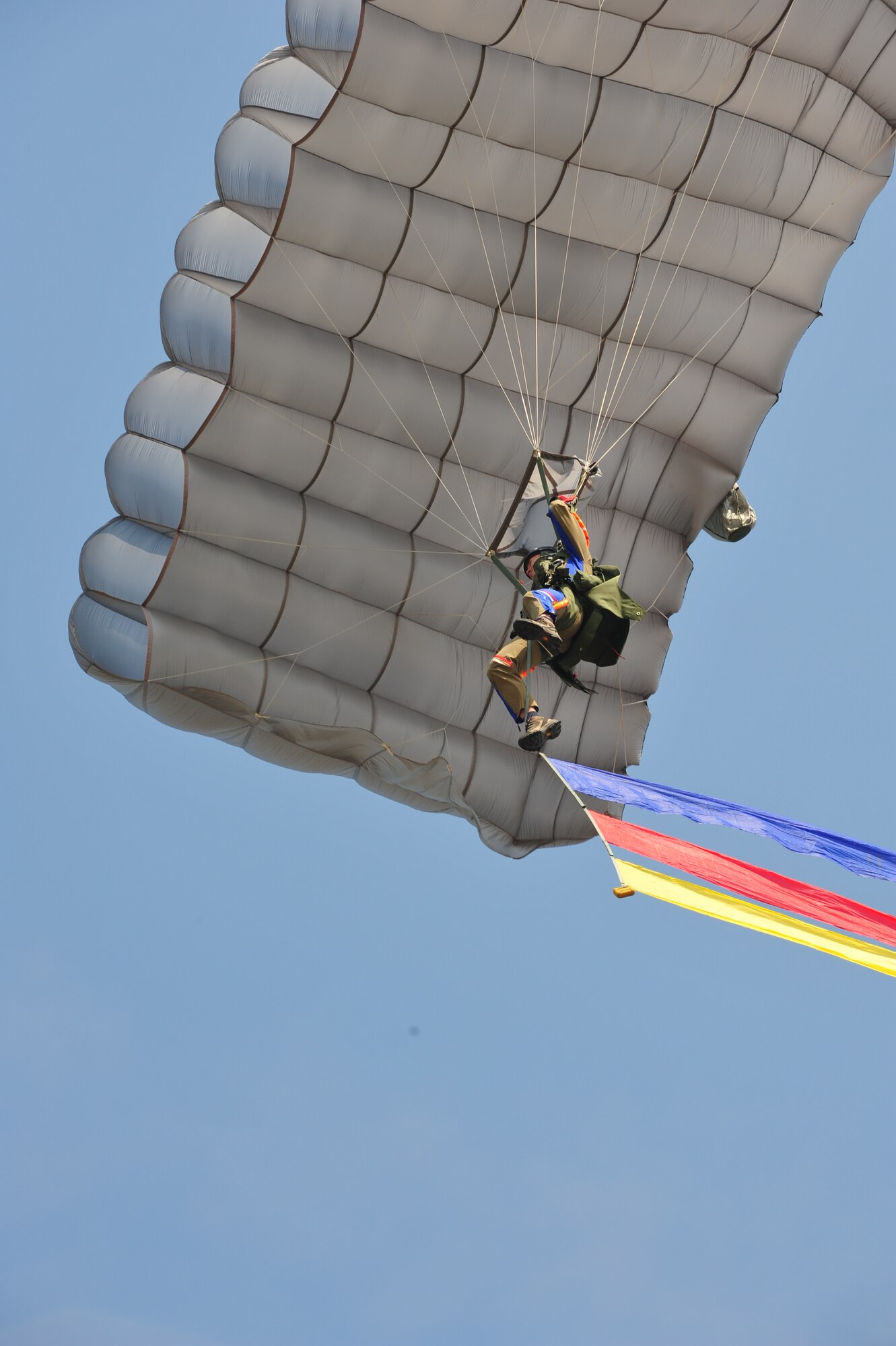 Republic of Korea Air Force Parachute Team members parachute down for the opening ceremonies of Air Power Day 2012 at Osan Air Base, ROK, Oct. 20, 2012. Air Power Day 2012 represents an annual opportunity for the United States to showcase its military personnel and unique equipment to a global audience. (U.S. Air Force photo/Staff Sgt. Stefanie Torres)