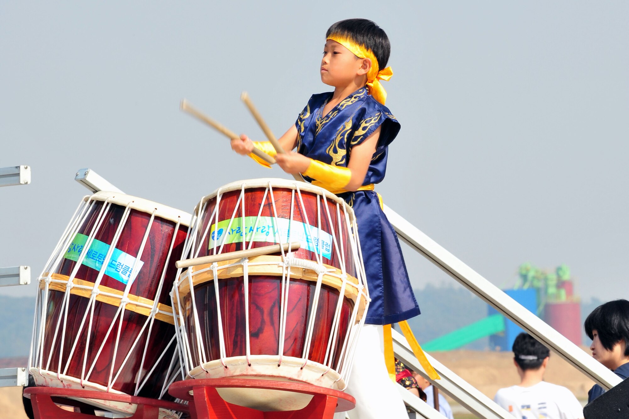 A member of the Nanta Kids Act performs during Air Power Day 2012 on Osan Air Base, Republic of Korea, Oct. 20, 2012. The air show highlights the relationship between the 51st Fighter Wing and the ROK through public demonstrations of military equipment and personnel. (U.S. Air Force photo/Airman 1st Class Alexis Siekert)