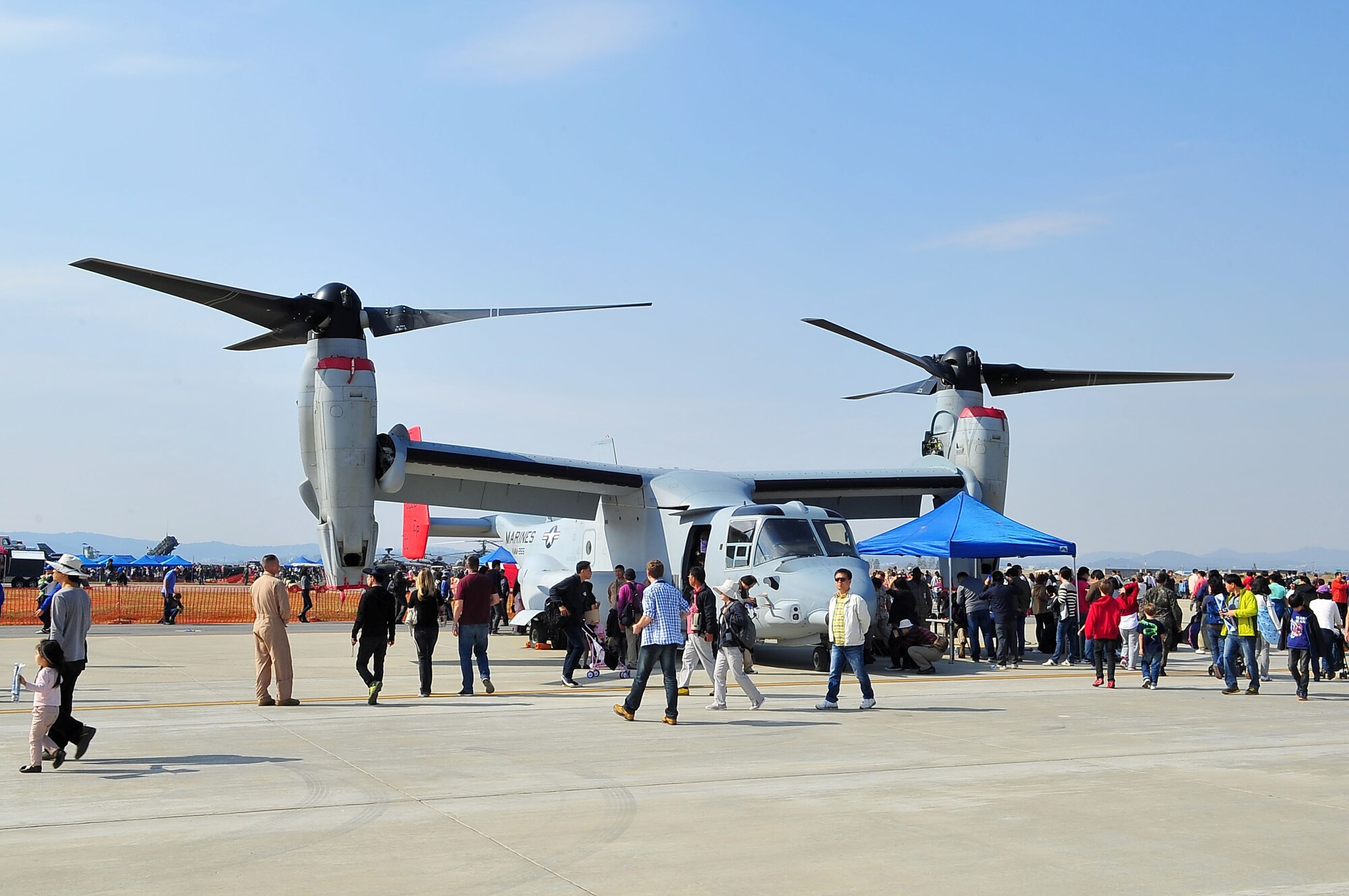 An MV-22C Osprey from the 1st Marine Medium Tilt-Roter Squadron, Okinawa, Japan is open to spectators during the Osan Air Power Day 2012 on Osan Air Base, Republic of Korea, Oct. 20, 2012. Air Power Day 2012 represents an annual opportunity for the United States to showcase its military personnel and unique equipment to a global audience. The airshow highlights the relationship between the 51st Fighter Wing and the Republic of Korea through public demonstrations of military equipment and personnel. (U.S. Air Force photo/Tech. Sgt. Raymond Mills)