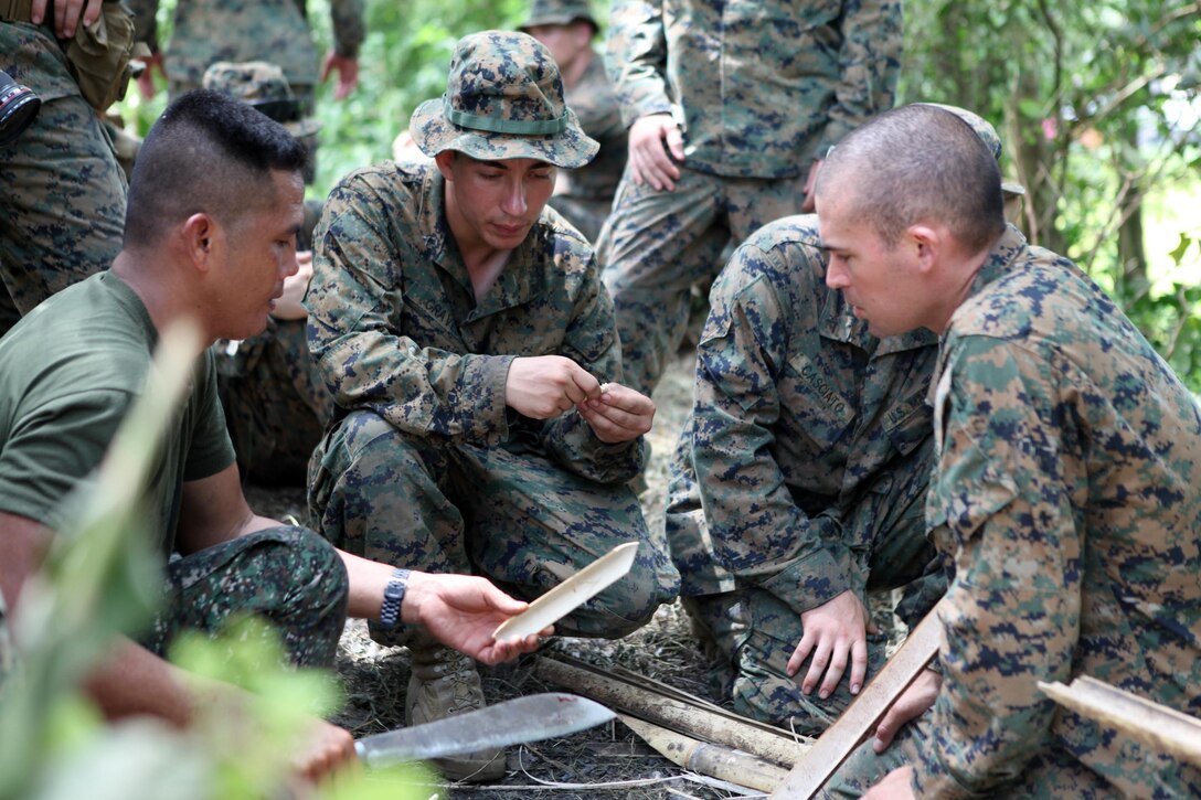 CROW VALLEY, Republic of the Philippines - Marines with Company G., Battalion Landing Team 2nd Battalion, 1st Marine Regiment, 31st Marine Expeditionary Unit, learn techniques to start a fire with bamboo from Philippine Marines during a class here, Oct. 12. The event is part of the 29th iteration of the Amphibious Landing Exercise, designed to increase the interoperability of the forces and strengthen their long standing bond. The 31st MEU is the only continuously forward-deployed MEU and is the Marine Corps’ force in readiness in the Asia-Pacific region.
