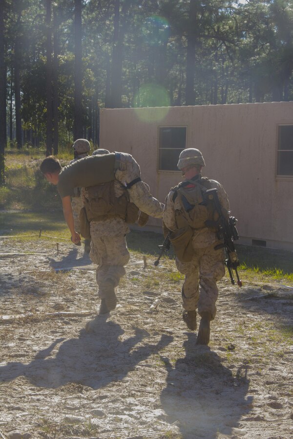 Marines of Company K, Battalion Landing Team (BLT) 3/2, currently reinforcing the 26th Marine Expeditionary Unit (MEU), egress from the objective during the mechanized raid course at Camp Lejeune, N.C., Oct. 10, 2012. BLT 3/2 is one of the three reinforcements of 26th MEU, which is slated to deploy in 2013.