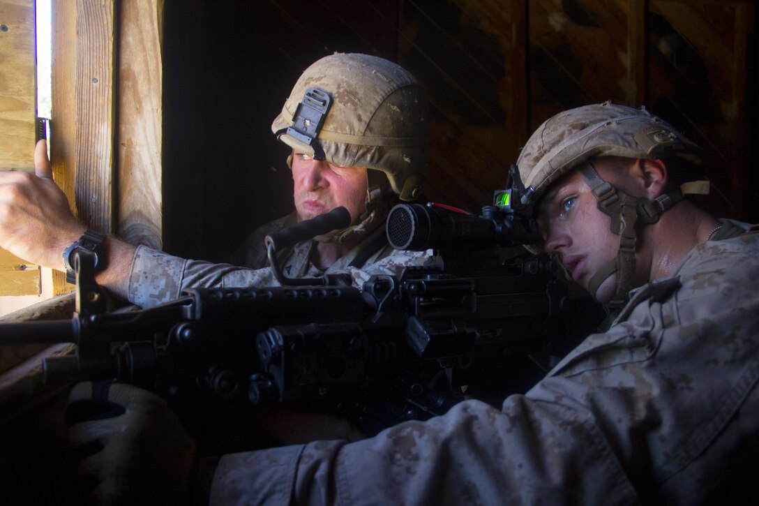 Marines of Company K, Battalion Landing Team (BLT) 3/2, currently reinforcing the 26th Marine Expeditionary Unit (MEU), provide suppressing fire during the mechanized raid course at Camp Lejeune, N.C., Oct. 10, 2012. BLT 3/2 is one of the three reinforcements of 26th MEU, which is slated to deploy in 2013.