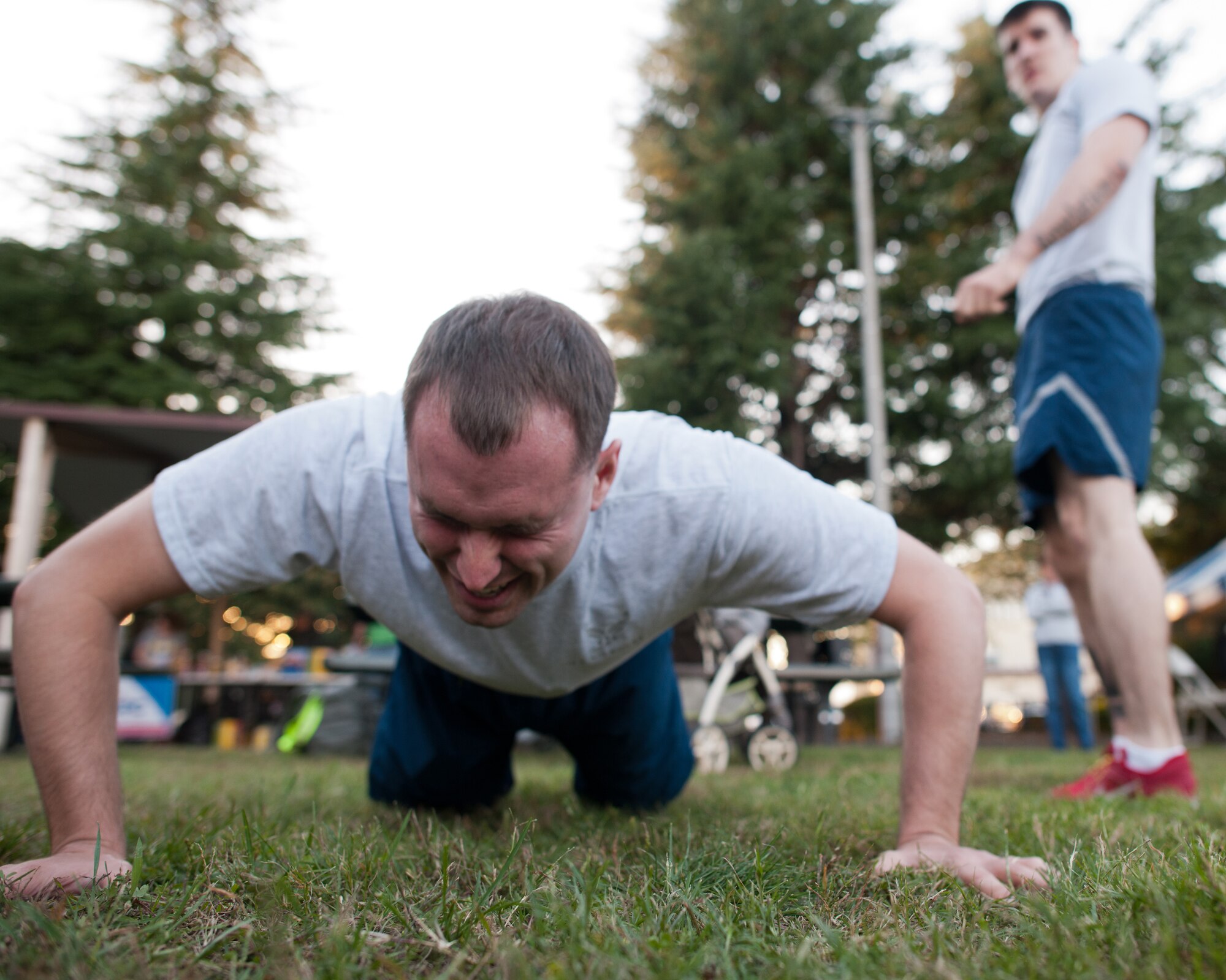 YOKOTA AIR BASE, Japan -- Staff Sgt. Chad Strohmeyer, 374th Airlift Wing, finishes his push-ups during the Combine Federal Campaign - Overseas 10-minute push-up competition at Yokota Air Base, Japan, Oct. 19, 2012. The goal at Yokota AB is to raise $275,000 for the CFC-O; Individuals can donate until Nov. 16. (U.S. Air Force photo by Osakabe Yasuo)  