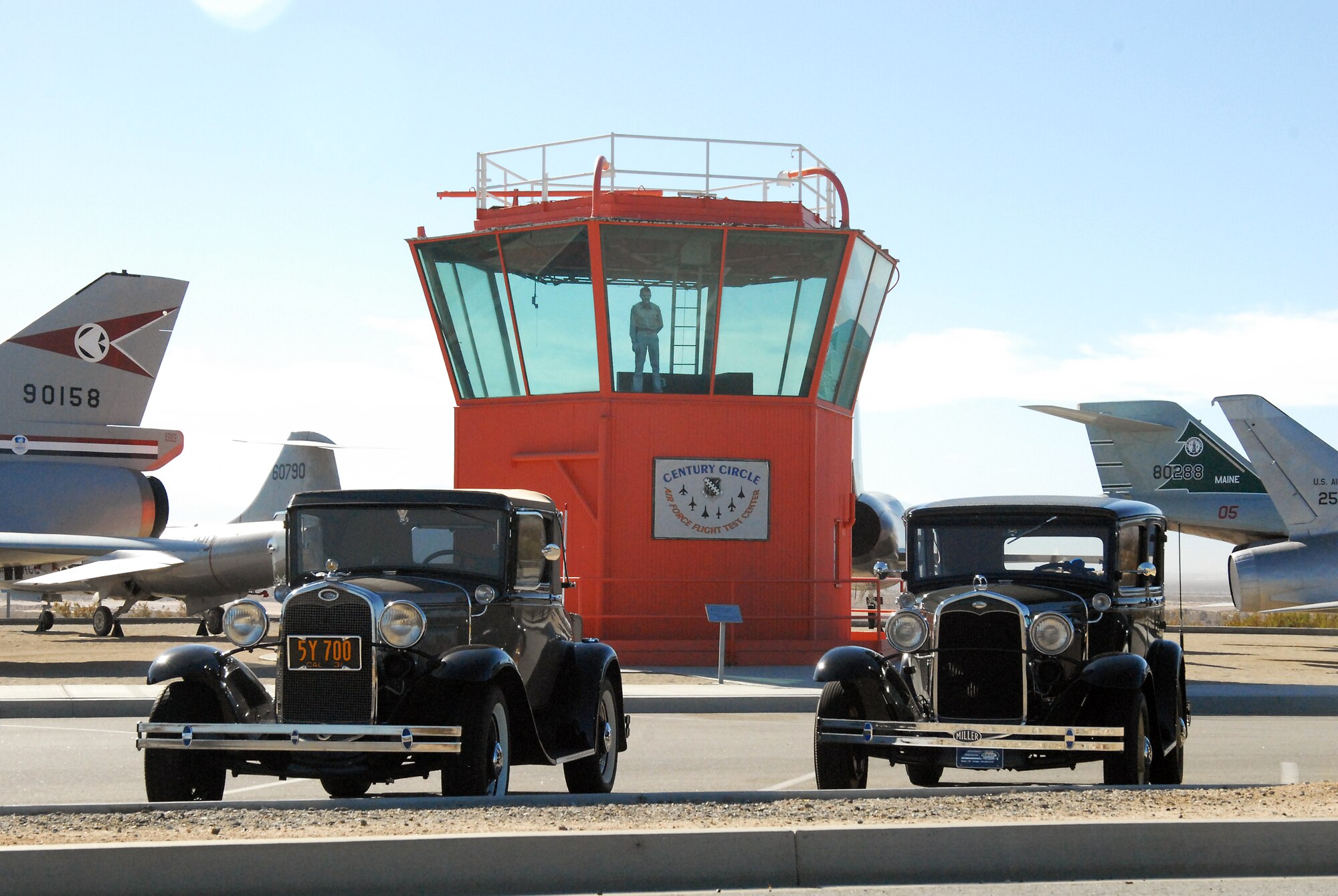 Paradise Valley Model A Club visited Edwards AFB Oct. 18 for a tour of the base.  These Model A's are parked in front of the former Edwards Tower control room at Century Circle. (U.S. Air Force photo by Kenji Thuloweit)