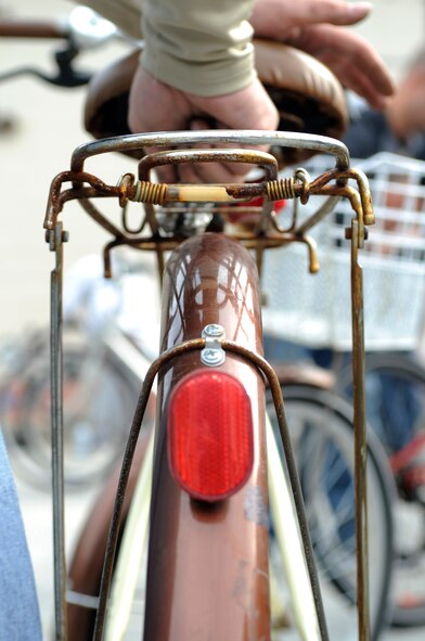 One of more than 50 repossessed bicycles has rust removed with aluminum foil during Operation Kunsan Rides Oct. 20, 2012, at Kunsan Air Base, Republic of Korea. “Service” is the second of five objectives under Airmen Committed to Excellence’s new SCALE agenda, the others being community, activity, leadership and education. (U.S. Air Force photo/Senior Airman Brigitte N. Brantley)