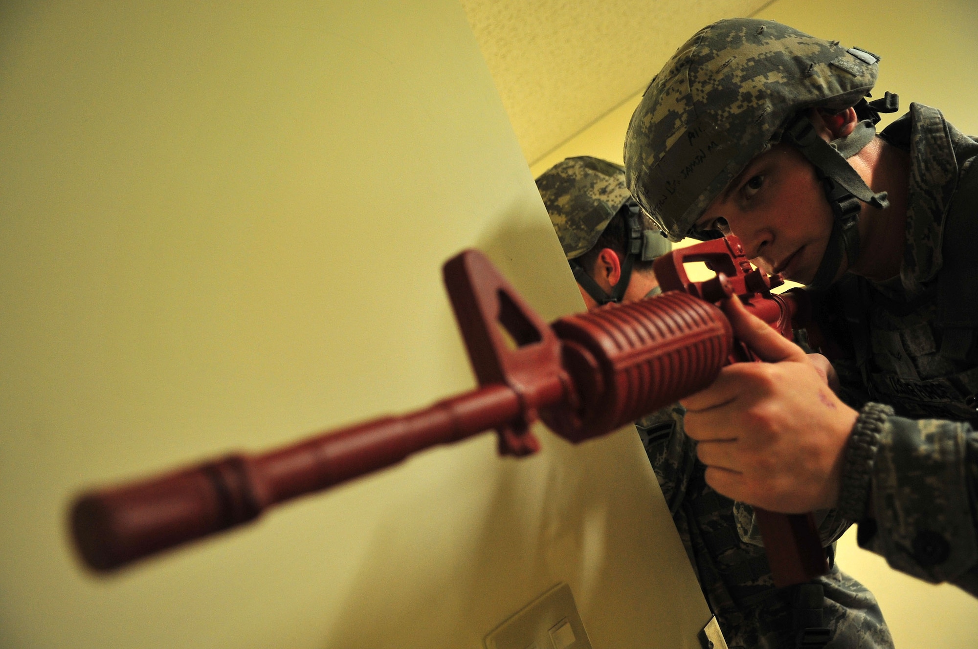 Airman 1st Class Benjamin Stern, 18th Security Forces Squadron member, stands guard during an active shooter training scenario on Kadena Air Base, Japan, Oct. 23, 2012. During the Pacific Air Forces readiness inspection various scenarios are used to test the wing’s ability to respond to a wide range of contingencies. (U.S. Air Force photo/Staff Sgt. Alesia Goosic)