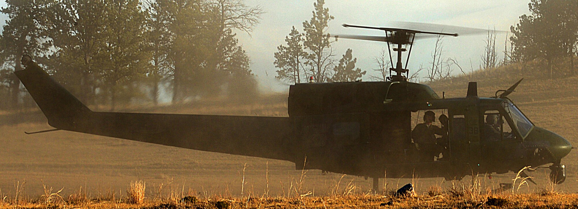 A UH-1N Huey helicopter lands during the Road Warrior exercise at Camp Guernsey, Wyo., Oct. 19, 2012. The helicopters used during the exercise provide a bird's-eye view of the nuclear resource convoy, while scanning for potential threats. (U.S. Air Force photo by Airman 1st Class Kayla Newman/Released)