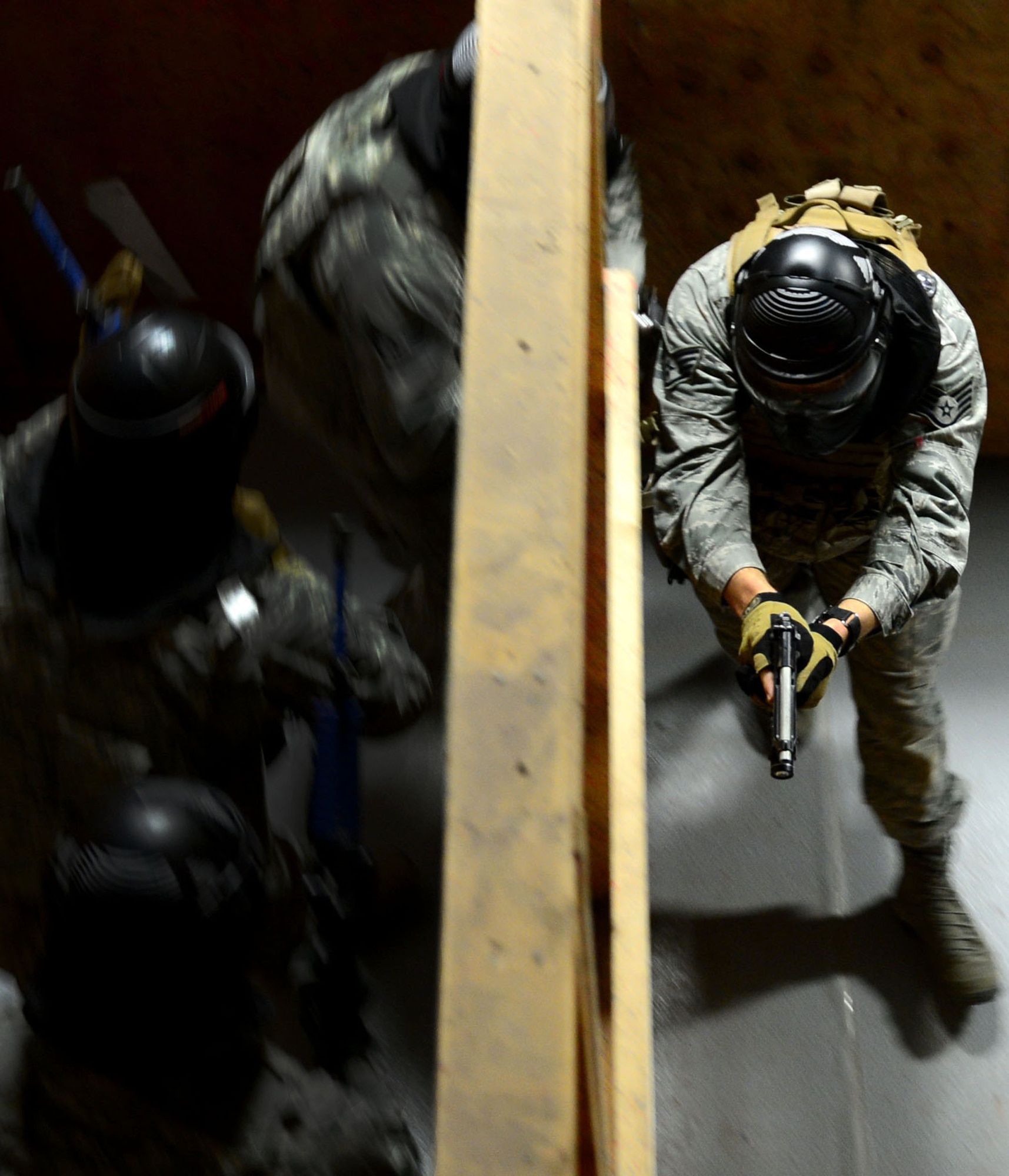 Airmen from F.E. Warren Air Force Base, Wyo., practice tactically clearing a room on the fourth day of a 10-day annual nuclear-convoy training exercise at Camp Guernsey, Wyo., Oct. 18, 2012. Security forces airmen are preparing for a rolling convoy which will evaluate their response to the theft of a nuclear device by hostile forces. (U.S. Air Force photo by Airman 1st Class Kayla Newman/Released)