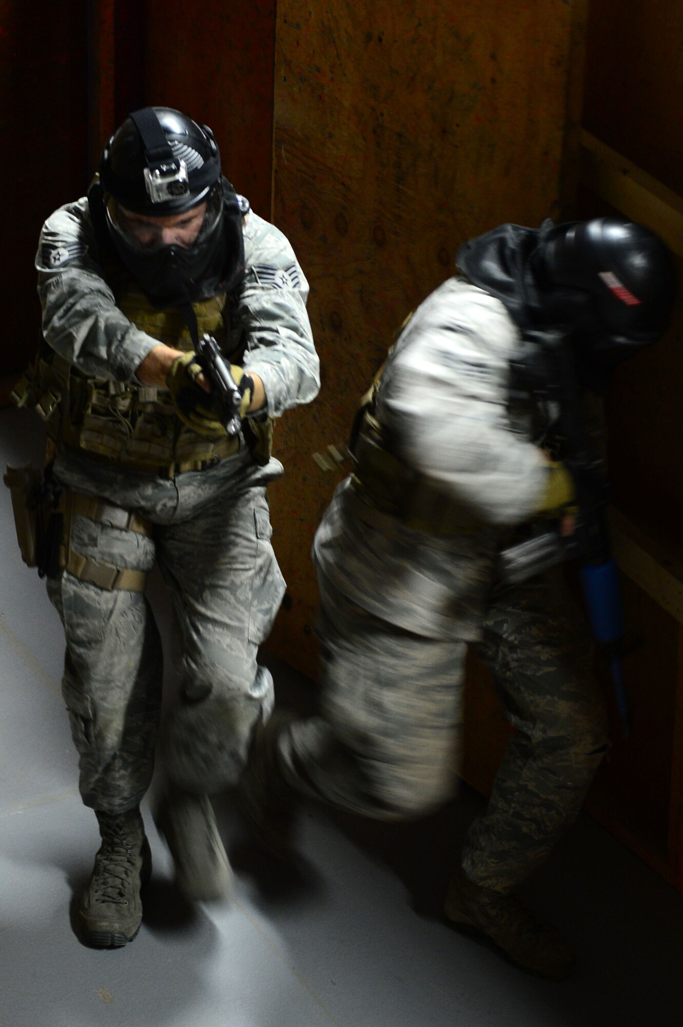 Security forces airmen from F.E. Warren Air Force Base, Wyo., tested their close-quarters combat skills against an opposing force team during Road Warrior X at Camp Guernsey, Wyo., Oct. 18, 2012. Road Warrior is a 10-day, annual nuclear-convoy training exercise designed to prepare airmen for the potential theft of a nuclear resource. (U.S. Air Force photo by Airman 1st Class Kayla Newman/Released)