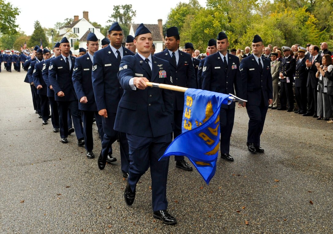 Airmen from Langley Air Force Base, Va., march by the reviewing stand along the parade route in Yorktown, Va., as part of the annual Yorktown Day festivities, Oct. 19, 2012. Other festivities included a patriotic ceremony and a demonstration by the 3rd Infantry Regiment – Commander-in-Chief’s Guard, from Fort Myer, Va. (U.S. Air Force photo by Staff. Sgt. Wesley Farnsworth / Released)