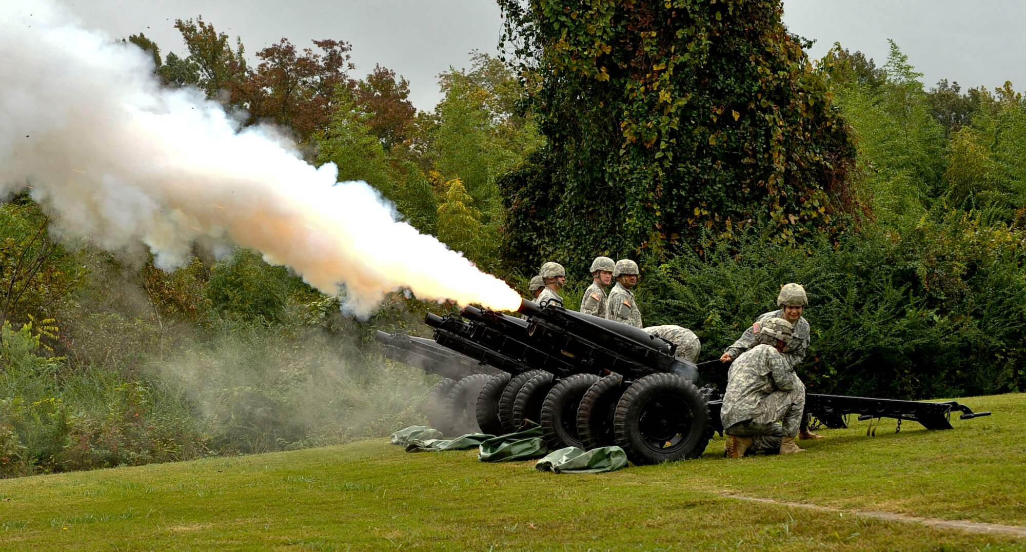 Members of the Headquarters Salute Battery of the United States, Fort Eustis, Va., fire off a volley from their cannons to mark the beginning of the Annual Yorktown Day festivities in Yorktown, Va., Oct. 19, 2012. Festivities included a parade, patriotic ceremony and a demonstration by the 3rd Infantry Regiment – Commander-in-Chief’s Guard, from Fort Myer, Va. (U.S. Air Force photo by Staff. Sgt. Wesley Farnsworth / Released) 