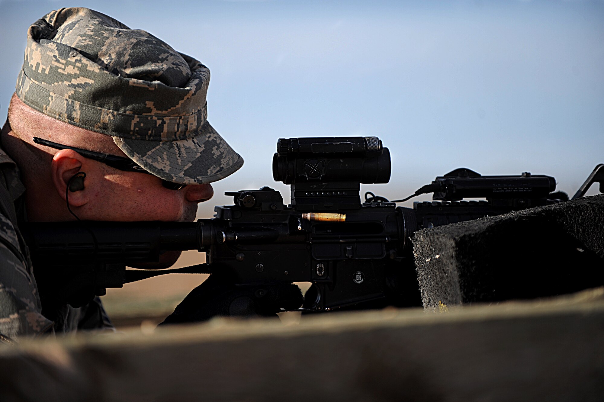 Senior Airman Patrick Gereben, 790th Missile Security Forces Squadron convoy response force leader, fires his M4 Carbine during a weapons proficiency course at the South Range of Camp Guernsey, Wyo., Oct. 16, 2012. The course was part of the 10-day Road Warrior exercise, designed to train Airmen on nuclear convoy operations. (U.S. Air Force photo by Senior Airman Jarad A. Denton/Released)