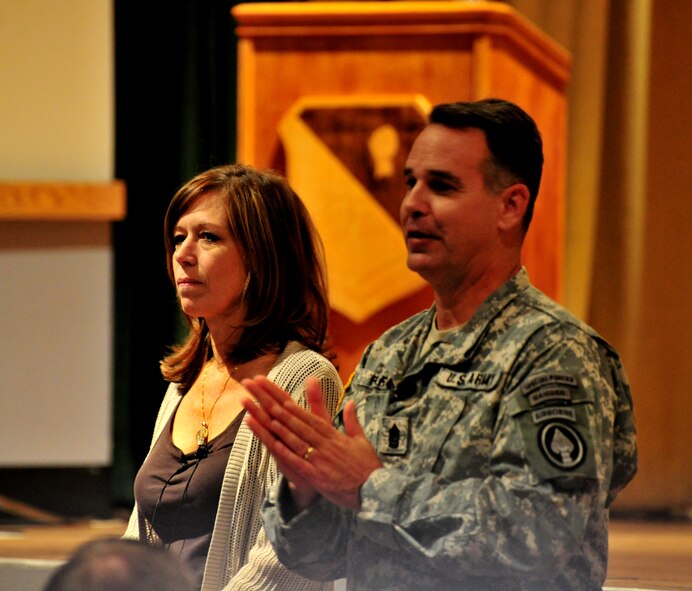 Air Commandos, spouses and civilians from Cannon Air Force Base, N.M., sat slack-jawed and spellbound as Army Command Sgt. Maj. Chris Faris, U.S. Special Operations Command’s senior enlisted advisor, and his wife, Lisa, described the decay of their 22-year marriage in graphic, unabashed detail at the base theater, Oct. 9, 2012. “The Chris and Lisa Show,” as it is commonly referred to, is in keeping with an initiative by Adm. Bill McRaven, USSOCOM commander, that calls war-weary service members to fight for the survival of their families in the face of seemingly insurmountable emotional turmoil.(U.S. Air Force photo/Airman 1st Class Xavier Lockley)