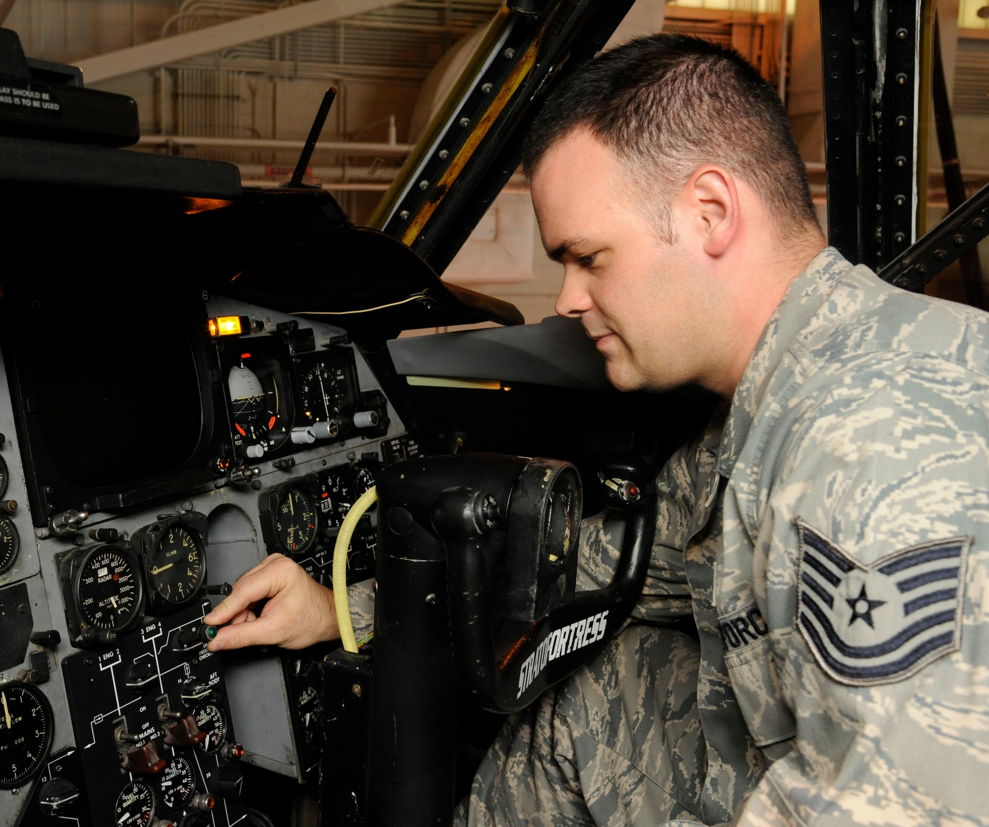 Tech. Sgt. Aaron Finney, 2nd Maintenance Squadron Accessories Flight fuels maintenance section, performs a "press to test" inside the cockpit of a B-52H Stratofortress on Barksdale Air Force Base, La., Oct. 16. This test checks to see if the lights which indicate fuel lines are functioning light up during flight. Performing tests such as these is just one of many responsibilities of the fuels maintenance section. (U.S. Air Force photo/Airman 1st Class Andrew Moua)(RELEASED)
