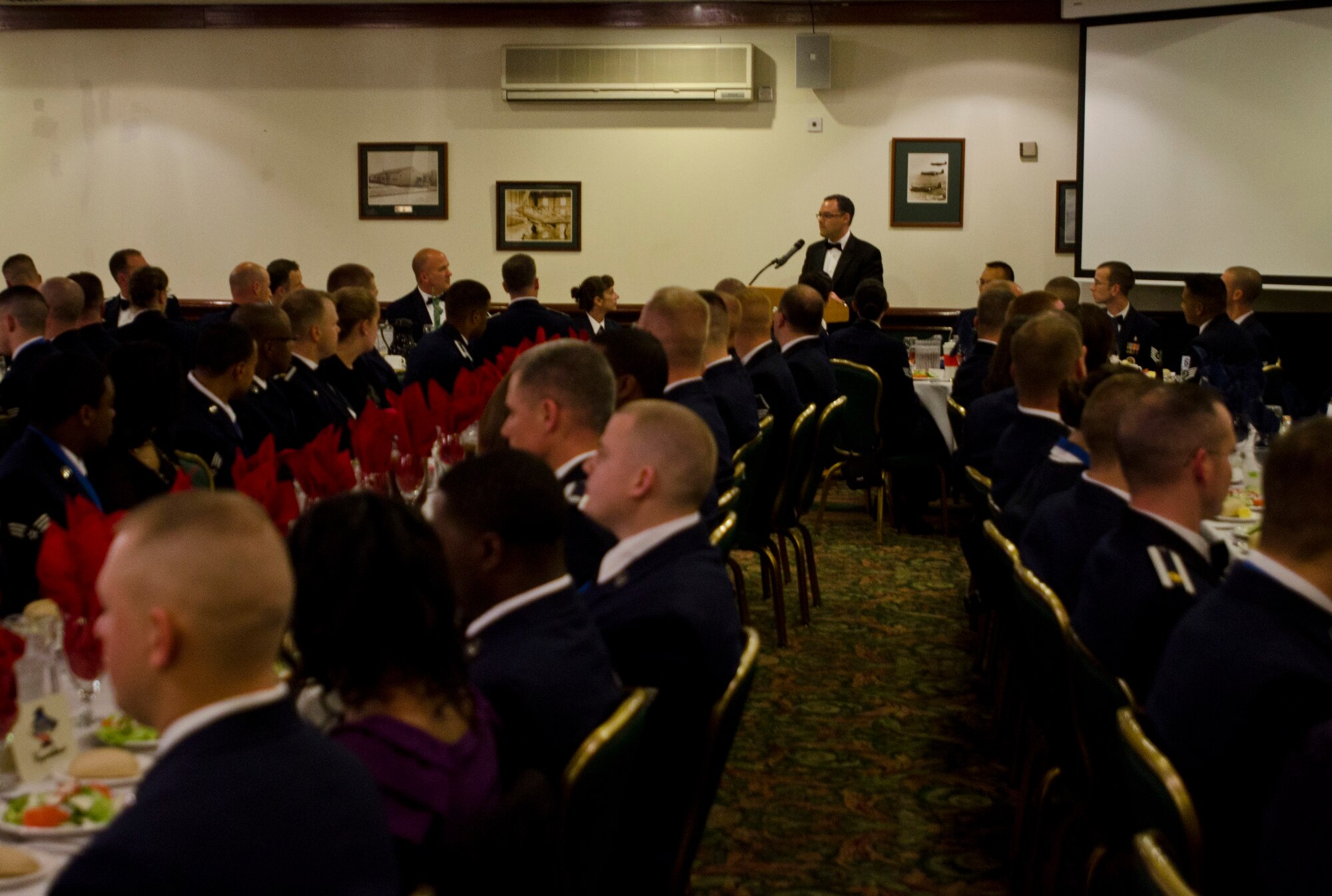 ROYAL AIR FORCE LAKENHEATH, England - The Honorable Daniel Ginsberg, Assistant Secretary of the Air Force for Manpower and Reserve Affairs, speaks at an Airman Leadership School Graduation at Eagle's Landing Oct. 18, 2012. Seventy-four Airmen graduated Mathies Airman Leadership School this class cycle and were taught a curriculum that consisted of subjects including military professionalism, expeditionary Airman, supervisory communication and supervising Airmen. (U.S. Air Force photo by Staff Sgt. Stephen Linch)