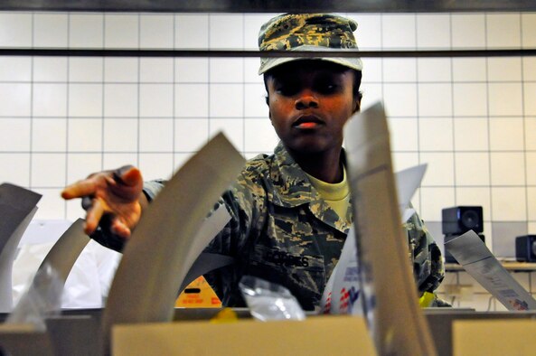 Staff Sgt. Shellisa Forbes, 786th Force Support Squadron food service journeyman, prepares boxed meals in the Jawbone Flight Kitchen on Ramstein Air Base, Germany, Oct. 16, 2012. The Jawbone Flight Kitchen Airmen's mission is to support and maintain 24/7 meal services and operations to members of Ramstein who are unable to make it to the main dining facility. (U.S. Air Force photo/ Airman 1st Class Hailey Haux)