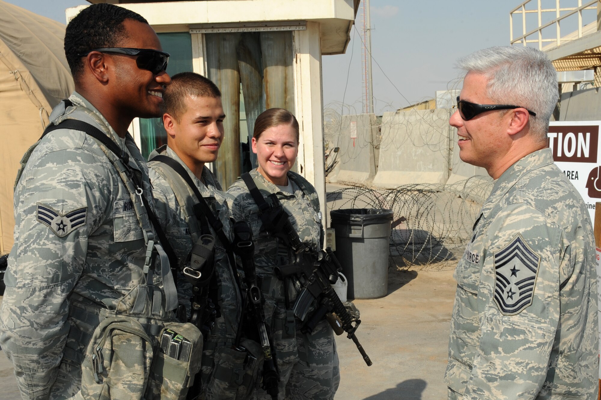 SOUTHWEST ASIA - U.S. Air Force Chief Master Sgt. Robert Sealey, U.S. Air Forces Central Command command chief, speaks to 380th Expeditionary Security Forces Squadron defenders on the flightline at the 380th Air Expeditionary Wing Oct. 17, 2012. Sealey toured the flightline and visited several units across the wing during his visit. (U.S. Air Force photo/Master Sgt. Scott MacKay)