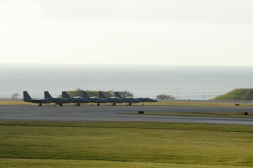 Six U.S. Air Force F-15 Eagle fighter jets prepare to take off during the first day of a Pacific Air Forces readiness inspection on Kadena Air Base, Japan, Oct. 22, 2012. The inspection tests how prepared Kadena Airmen are to handle real-world contingencies. (U.S. Air Force photo/Airman 1st Class Brooke P. Beers)