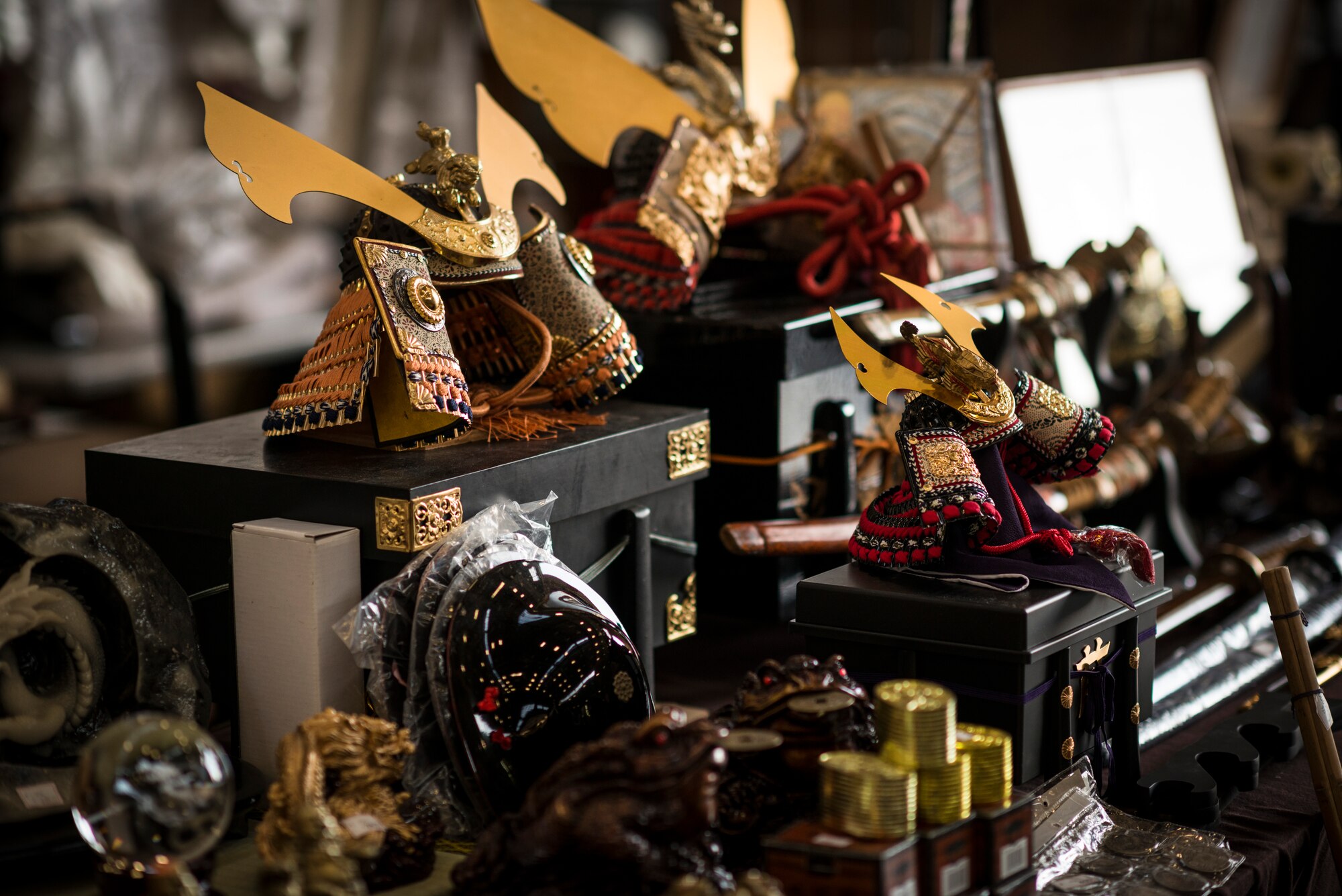 YOKOTA AIR BASE, Japan -- Miniature samurai helmets line a vendor's booth at the Yokota Officers' Spouses' Club Asian Bazaar at Yokota Air Base, Japan, Oct. 20, 2012. (U.S. Air Force photo by Tech. Sgt. Samuel Morse)