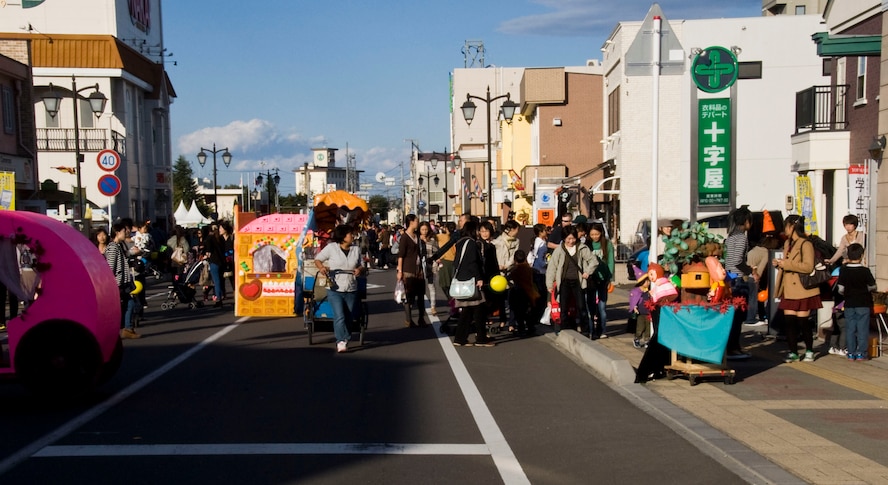Japanese and American citizens knock on doors of local businesses on Main Street for candy during the Misawa Halloween Festival at Misawa City, Japan, Oct. 20, 2012. Japanese and American children of all ages were given the opportunity to show off their costumes during the costume contest and eat some sweets before Halloween. (U.S. Air Force photo/Airman 1st Class Kenna Jackson) 

