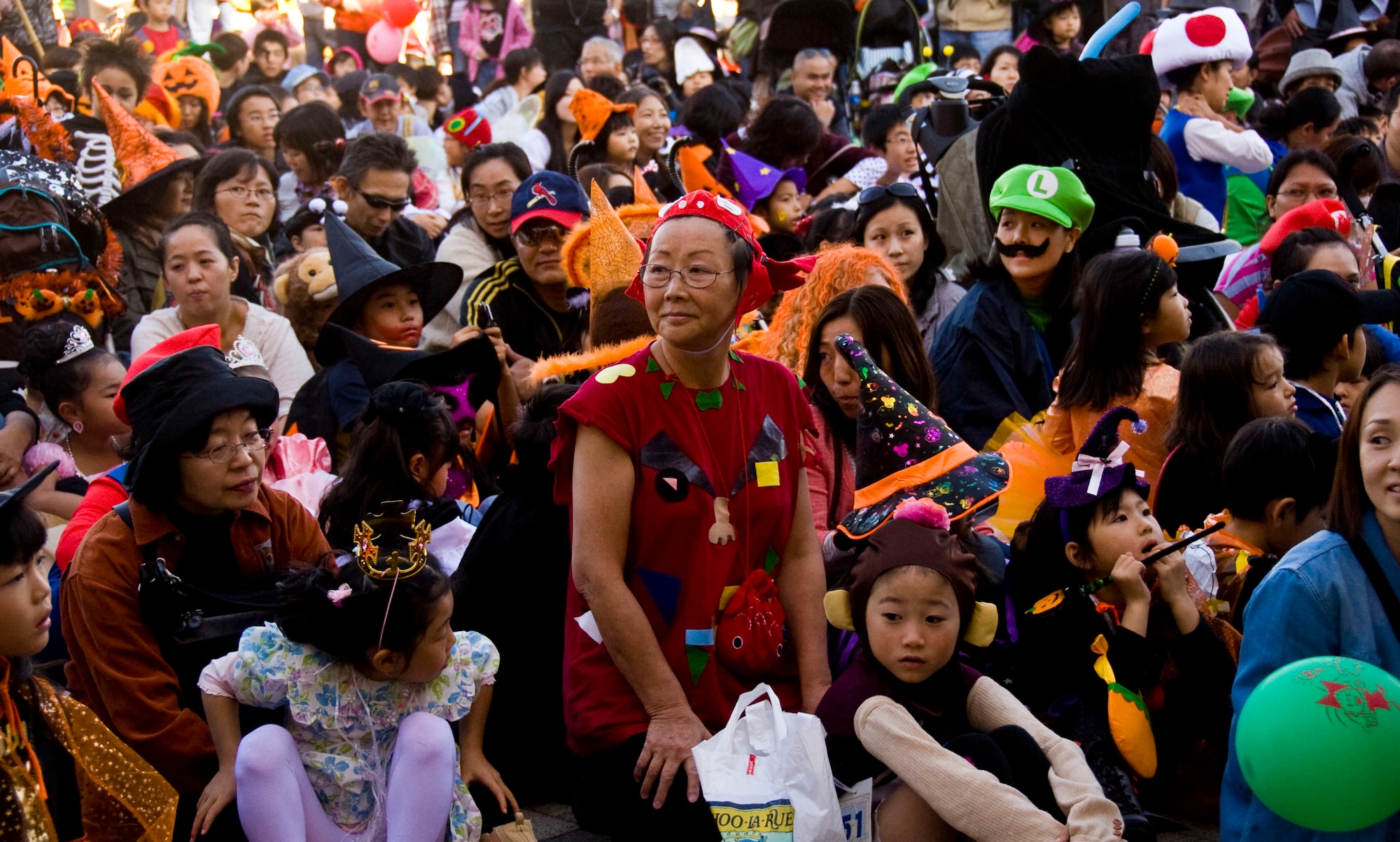 Thousands of Japanese and American citizens watch the costume contest during the Misawa Halloween Festival at Sky Plaza in Misawa City, Japan, Oct. 20, 2012. The Misawa Halloween Festival is an annual event where children and adults dress up and enjoy the season. (U.S. Air Force photo by Airman 1st Class Kenna Jackson)