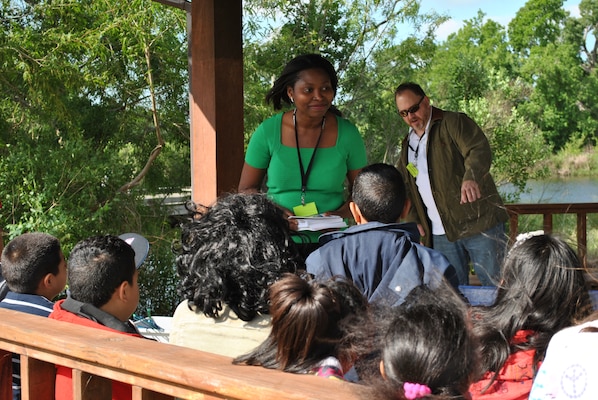 USACE Galveston District Regulatory Specialist Tosin Sekoni volunteers at the Harris County Precinct One Earth Day 2012 celebration at Challenger Seven Memorial Park. Sekoni interacted with approximately 200 children and explained the importance of watershed preservation and water safety.