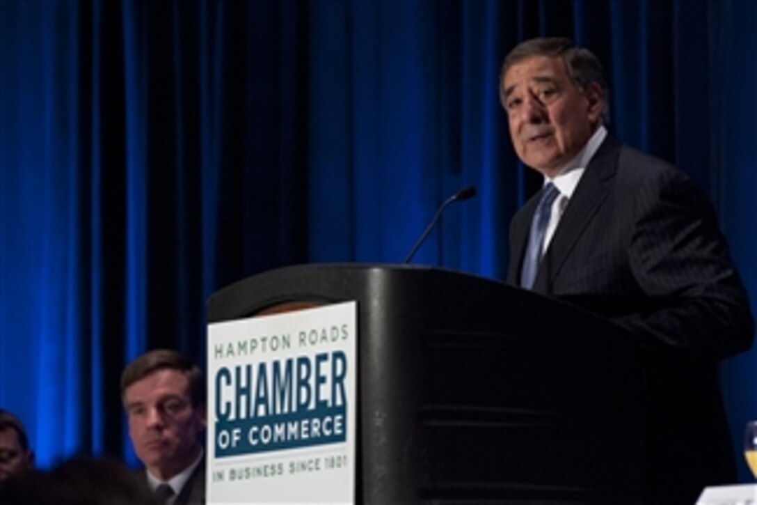 Secretary of Defense Leon E. Panetta addresses the audience at the Hampton Roads Chamber of Commerce meeting in Norfolk, Va., on Oct 19, 2012.  Panetta spoke of the threat of warfare in cyberspace and of the effects sequestration would have on defense communities like that of the Norfolk area.  