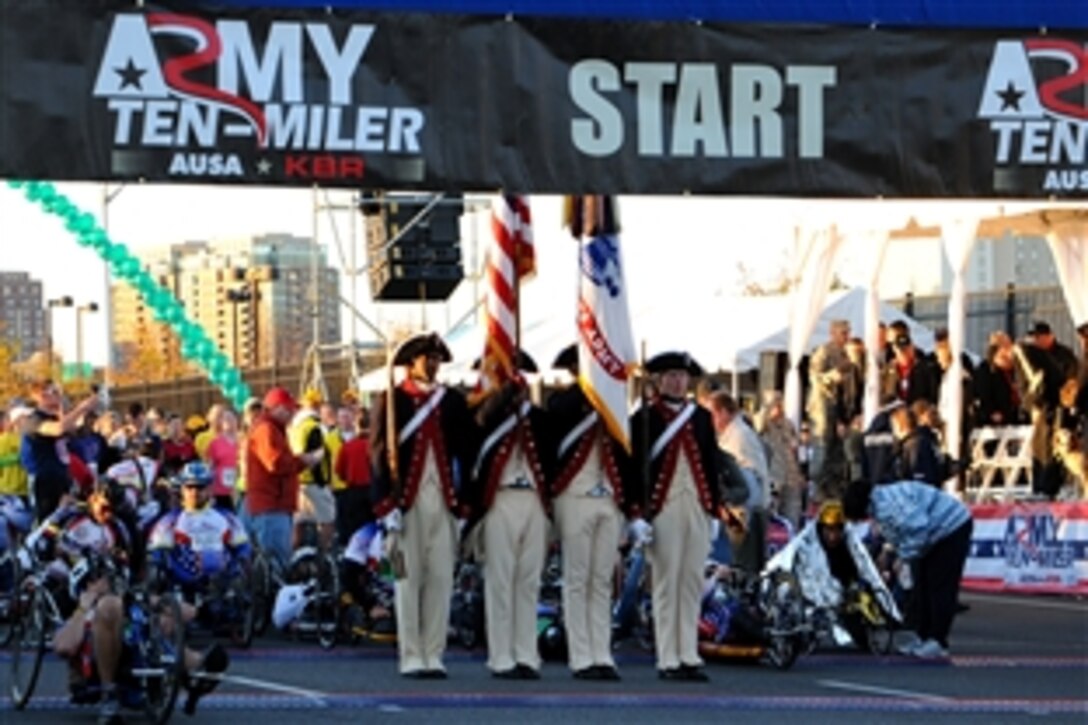 The Continental Color Guard, 3d U.S. Infantry Regiment, post the national colors before the start of the 2012 Army 10 Miler at the Pentagon, Arlington, Va., Oct. 21, 2012. CCG's mission is to showcase the U.S. Army's precision nationally and internationally and displays the Colors in numerous parades and ceremonies thought the year.