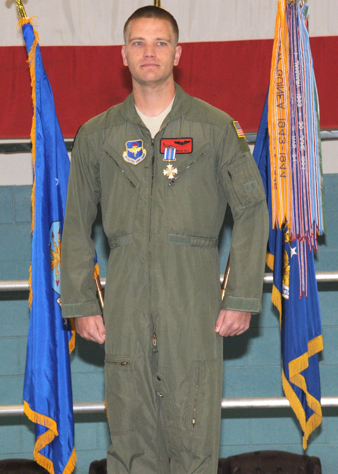 KIRTLAND AFB, N.M. -- Staff Sergeant Brandon Hill, 512th Rescue Squadron, received the Distinguished Flying Cross during a ceremony on base Oct. 23 for his accomplishments during a deployment to Afghanistan in support of Operation Enduring Freedom. (Photo by Dennis Carlson)
