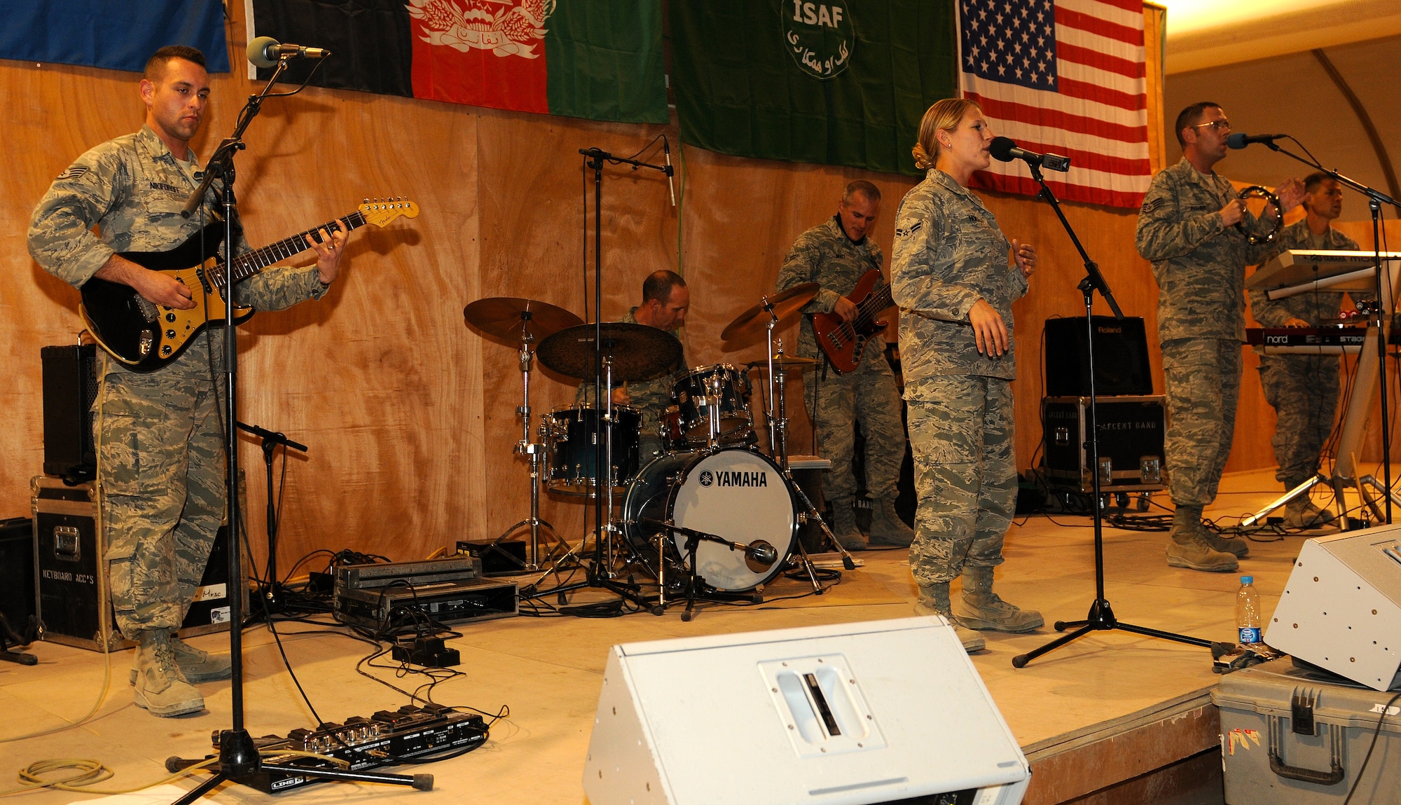 The U.S. Air Forces Central Expeditionary Band-Galaxy performs a song for an audience at the morale welfare and activities tent in the International Security Assistance Force Joint Command, Afghanistan. In 90 days the AFCENT Band-Galaxy traveled to forward operating bases and posts throughout Afghanistan and Iraq. (U.S. Army photo/Sgt. Michael Reinsch)
