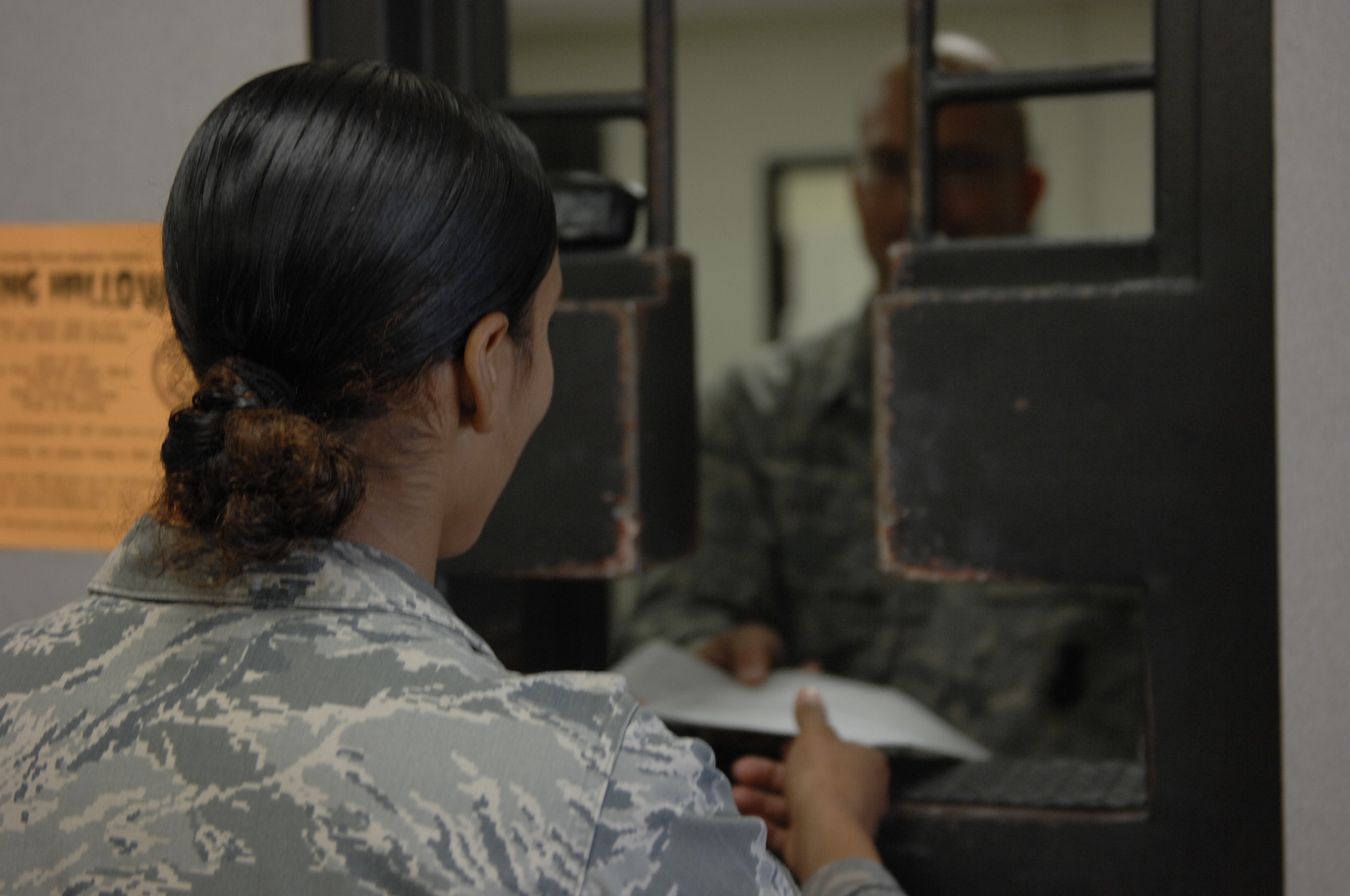 Staff Sgt. Amber Howard, 20th Security Force Squadron command support staff, demonstrates how to register a weapon at Shaw Air Force Base, S.C., Oct. 23, 2012. Personnel living in the dorms, visitors’ quarters, temporary lodging facilities and distinguished visitors quarters are prohibited from possessing weapons and must register and store their privately owned weapons in 20th SFS armory immediately upon arriving on the installation. Personnel residing in on-base housing must register their firearms within 72 hours of signing for their residency keys. (U.S. Air Force photos by Airman 1st Class Krystal M. Jeffers/Released)
