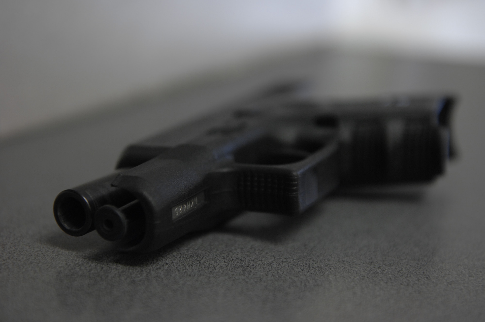 Personally owned weapons like this .4 Zero Glock can be registered at 20th Security Forces Squadron at Shaw Air Force Base, S.C. Personnel living in the dorms, bachelor living quarters, temporary living facilities or lodging facilities may register weapons and store all firearms and ammunition with 20th SFs armory. (U.S. Air Force photos by Airman 1st Class Krystal M. Jeffers/Released)