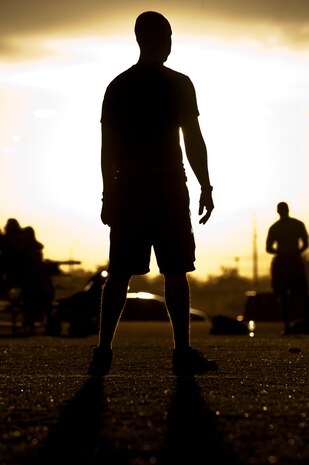 A  99th Logistics Readiness Squadron Airman waits for the kick-off during a football game Oct. 15, 2012, at Nellis Air Force Base, Nev. The 99th LRS played the 99th Air Base Wing Public Affairs team. (U.S. Air Force photo by Airman 1st Class Jason Couillard)