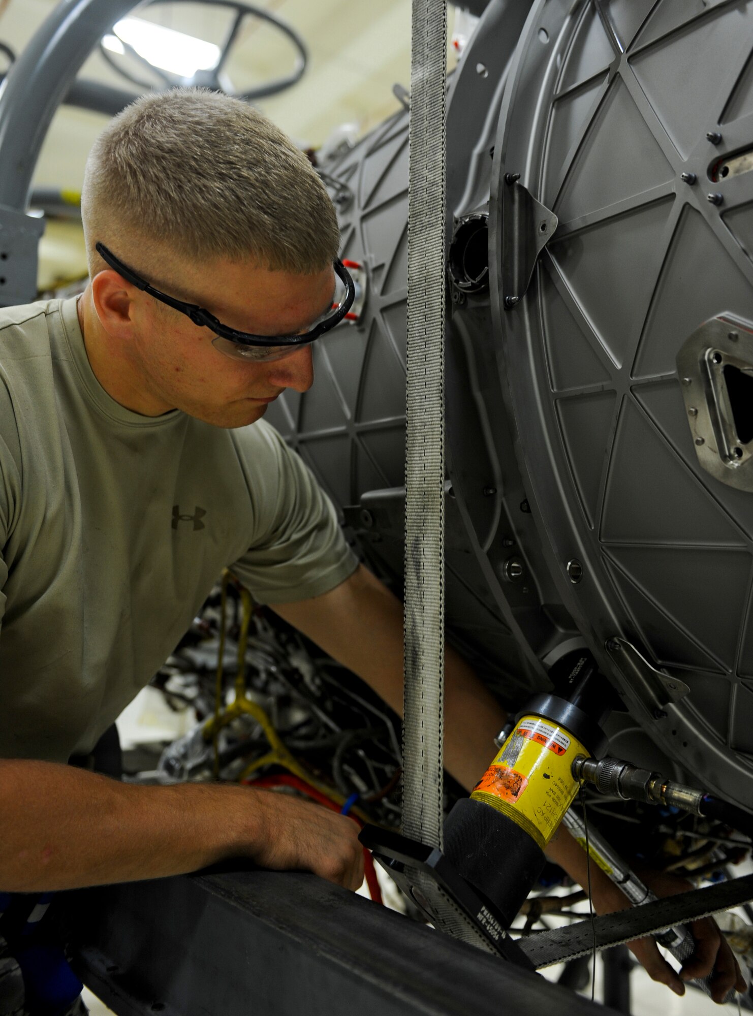 U.S. Air Force Senior Airman Andrew Huston, 18th Component Maintenance Squadron aerospace propulsion journeyman, tightens a screw during Exercise Beverly Bearcat 12-1, an operational readiness inspection, on Kadena Air Base, Japan, Oct. 24, 2012. The inspectors will formally evaluate the wing's ability to fulfill its commitments as required under the Japan-U.S security alliance. (U.S. Air Force photo/Airman 1st Class Justin Veazie)