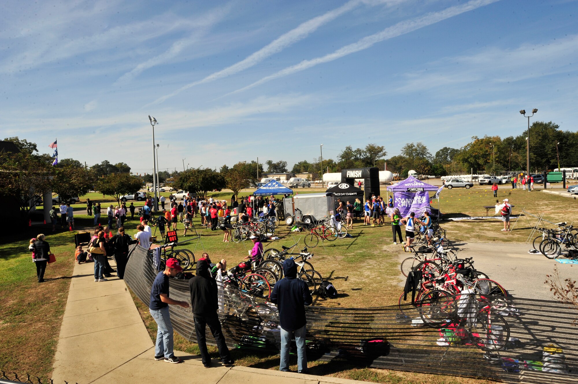 Team Shaw members volunteer at the TriSumter triathlon, Sumter, S.C., Oct., 20, 2012. 15 Airmen from Shaw Air Force Base volunteered to help out with the event.  The event consisted of a 300 yard swim, a 16 mile bike ride and a 3.1 mile run.(U.S. Air Force photo by Airman Nicole Sikorski/Released)(U.S. Air Force photo by Airman Nicole Sikorski/Released)