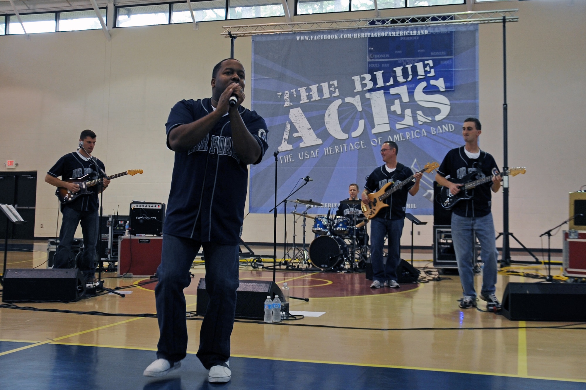 Members of the Blue Aces perform at the youth center on Seymour Johnson Air Force Base, N.C., Oct. 17, 2012. After the band played two, 45-minute sets, the members posed for photos with fans and signed autographs. (U.S. Air Force photo/Airman 1st Class John Nieves Camacho/Released) 