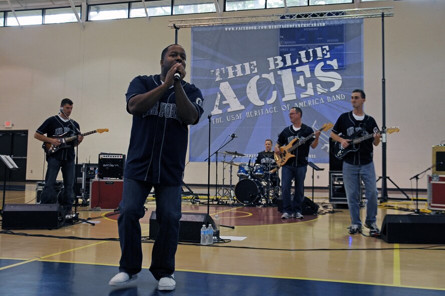 Members of the Blue Aces perform at the youth center on Seymour Johnson Air Force Base, N.C., Oct. 17, 2012. After the band played two, 45-minute sets, the members posed for photos with fans and signed autographs. (U.S. Air Force photo/Airman 1st Class John Nieves Camacho/Released) 