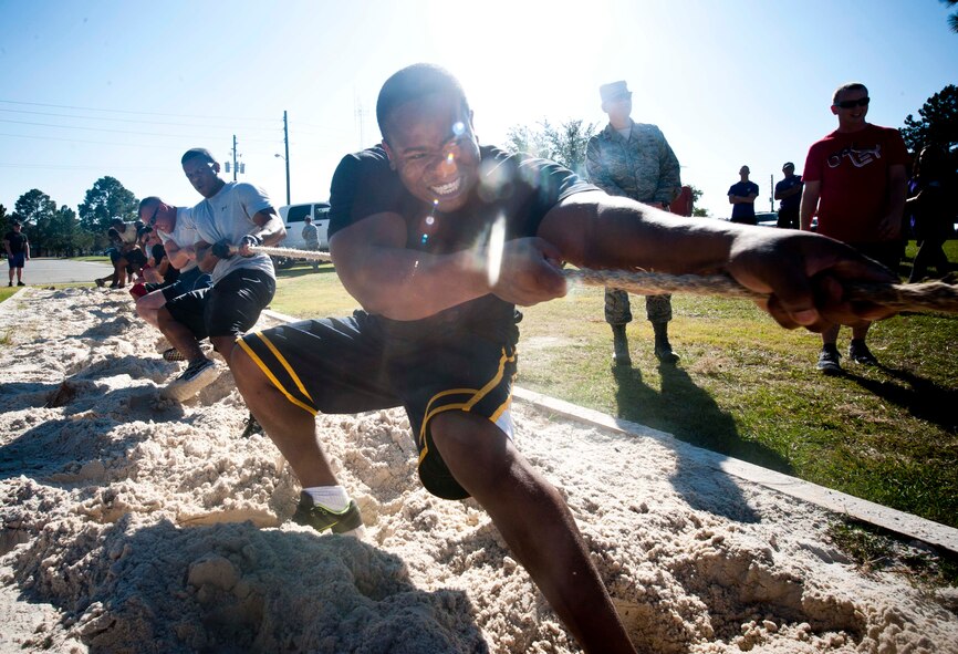 U.S. Air Force Airmen from the 23d Logistics Readiness Squadron participate in tug-of-war during Super Sports Day at Moody Air Force Base, Ga., Oct. 19, 2012. The 23d LRS lost against the 23d Civil Engineer Squadron in the final round after defeating three other teams. (U.S. Air Force photo by Airman 1st Class Paul Francis/Released) 
