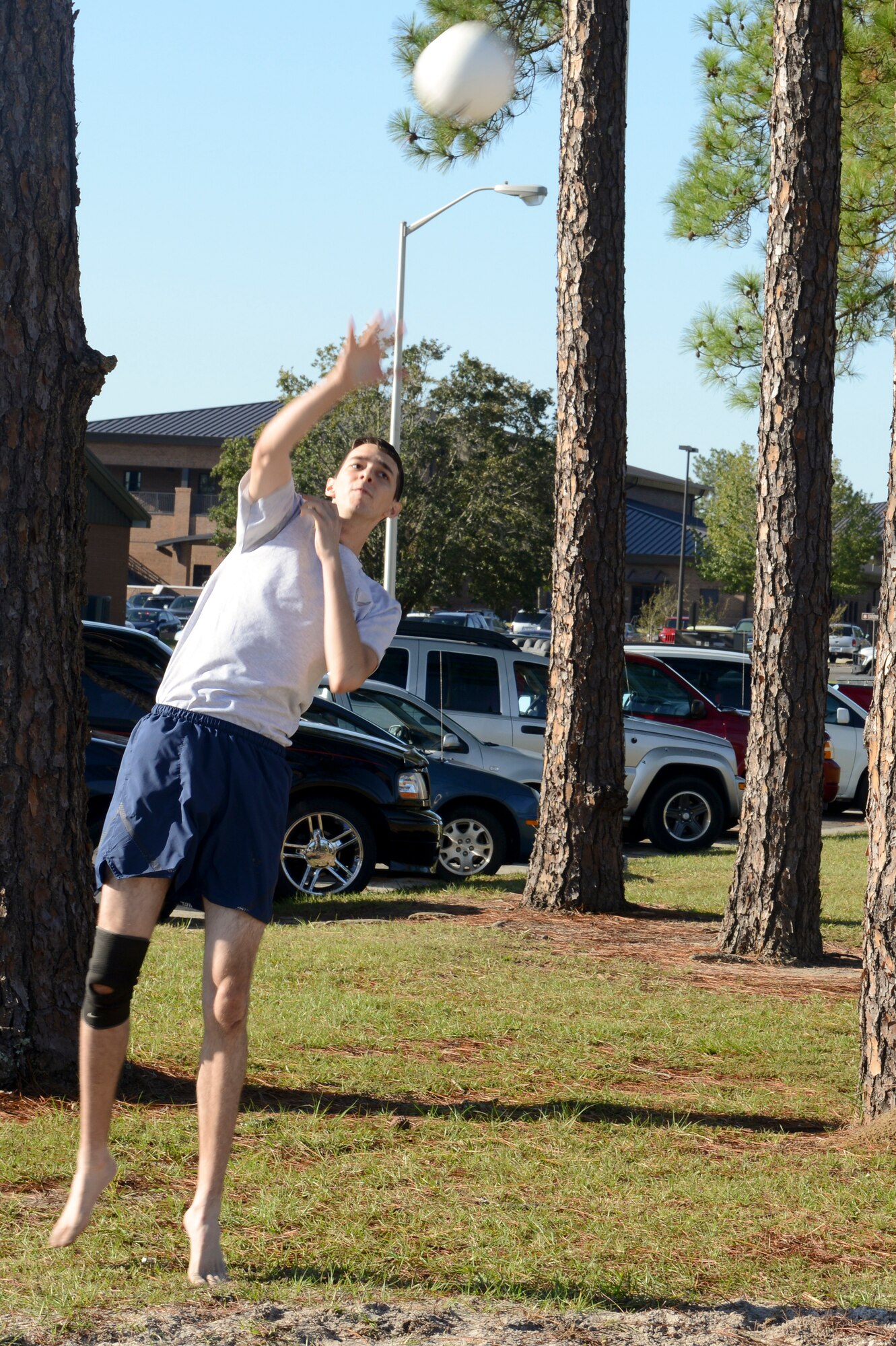 Nathaniel Gray, 23d Civil Engineer Squadron, serves during a volleyball game for Super Sports Day at Moody Air Force Base, Ga., Oct. 19, 2012. Moody Airmen participated in various sporting events throughout the day to earn bragging rights and points toward their organizations. (U.S. Air Force photo by Staff Sgt. Joshua J. Garcia/Released)