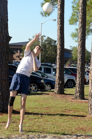 Nathaniel Gray, 23d Civil Engineer Squadron, serves during a volleyball game for Super Sports Day at Moody Air Force Base, Ga., Oct. 19, 2012. Moody Airmen participated in various sporting events throughout the day to earn bragging rights and points toward their organizations. (U.S. Air Force photo by Staff Sgt. Joshua J. Garcia/Released)