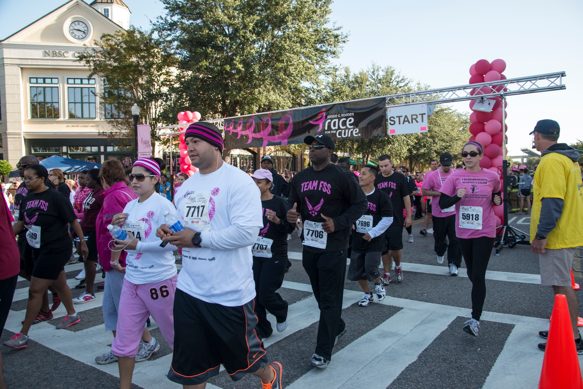 Members of the 628th Force Support Squadron, run in the Susan G. Komen Race for the Cure in Charleston, S.C., Oct. 20, 2012.  They ran in honor of Senior Airman Latisha Chong, who was diagnosed with breast cancer Jan. 19, 2012. Chong was told she was cancer free June 19, 2012.  628th FSS put together a team of more than 50 runners with the goal of raising $1,000 in donations. The team not only met the $1,000 goal, they exceeded it by more than $700 with donations of $1,700.   (U.S. Air Force/Staff Sgt. Rasheen Douglas)