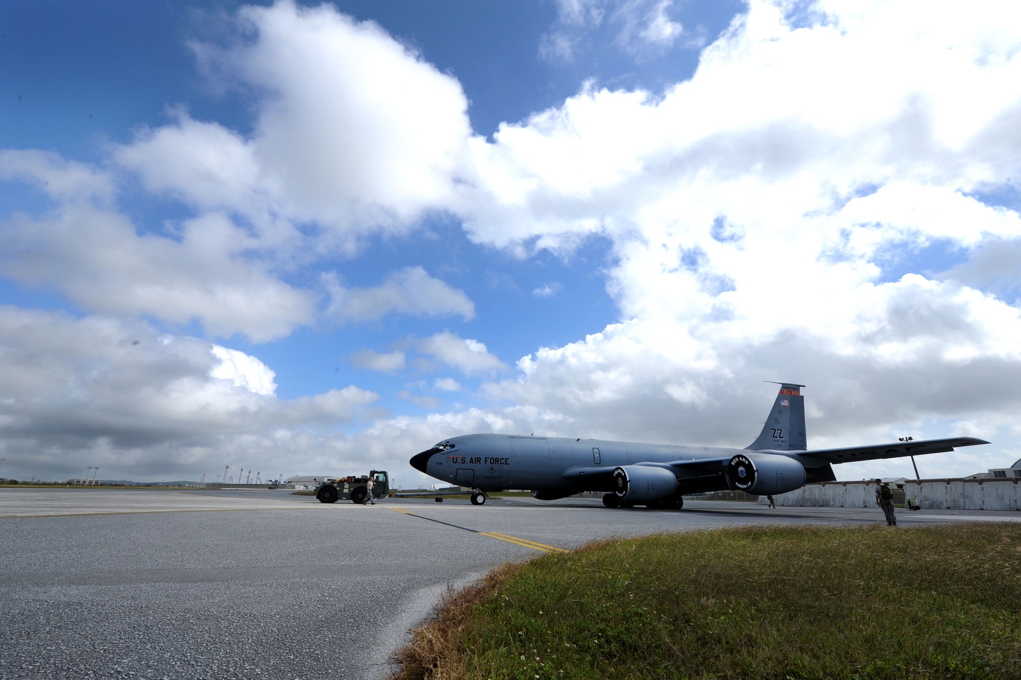 A U.S. Air Force KC-135 Stratotanker refueling aircraft from the 909th Air Refueling Squadron is backed into a spot for 718th Air Maintenance Squadron Airmen to perform routine maintenance during a Pacific Air Forces readiness inspection on Kadena Air Base, Oct. 23, 2012. The 718th AMXS maintains the Air Force’s only air refueling, combat search and rescue, and air battle management assets in the Western Pacific region.  (U.S. Air Force photo/Airman 1st Class Brooke P. Beers)