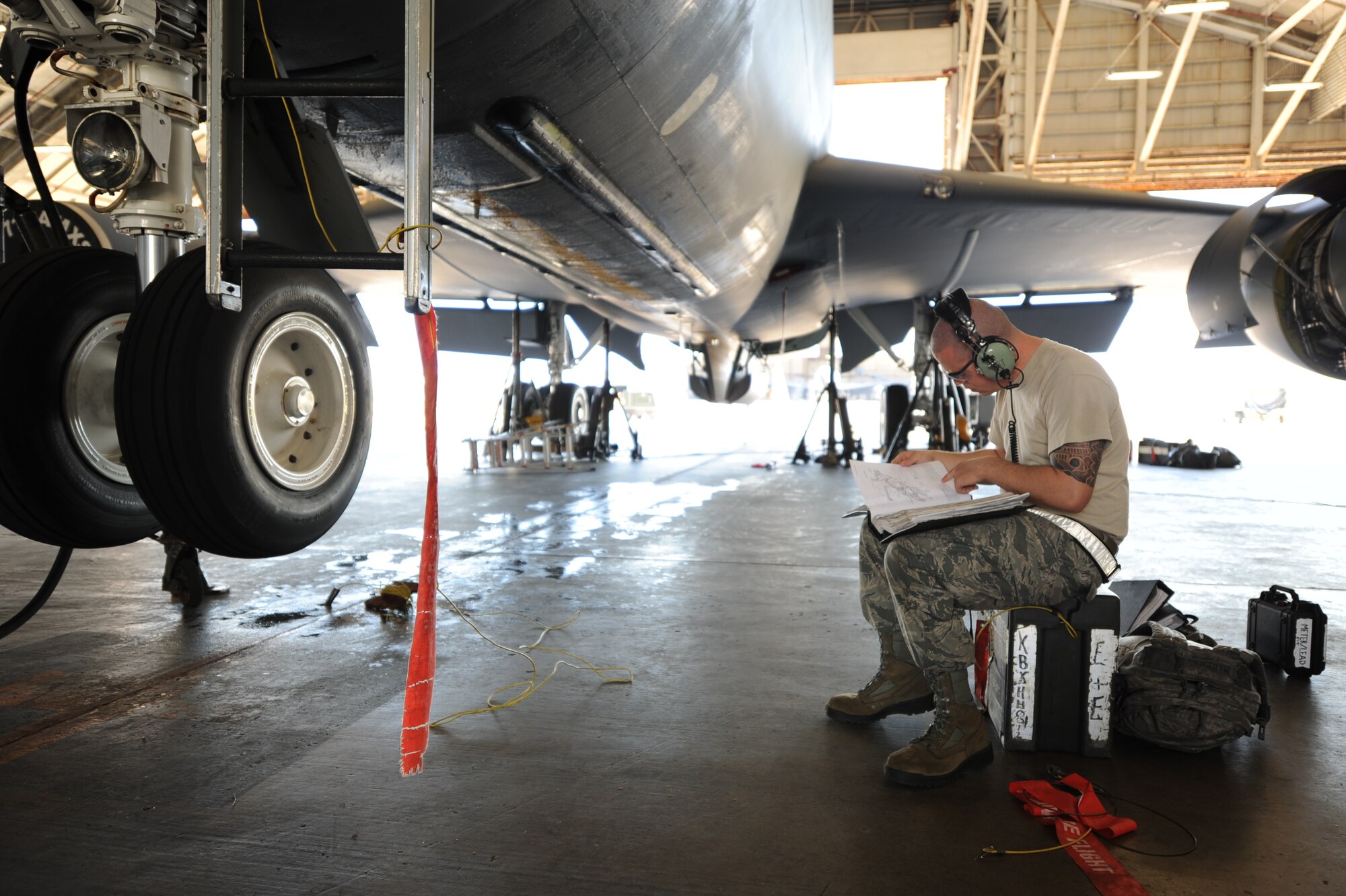 U.S. Air Force Staff Sgt. Martin Cheshier, 718th Air Maintenance Squadron electrical and environmental systems technician, reviews technical orders during a Pacific Air Forces readiness inspection on Kadena Air Base, Oct. 23, 2012. The PACAF inspection team has been evaluating the 18th Wing’s capability to perform its mission during contingency or humanitarian operations.  (U.S. Air Force photo/Airman 1st Class Brooke P. Beers)